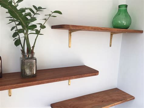 black and gold metal brackets for open face shelving|gold shelf supports.